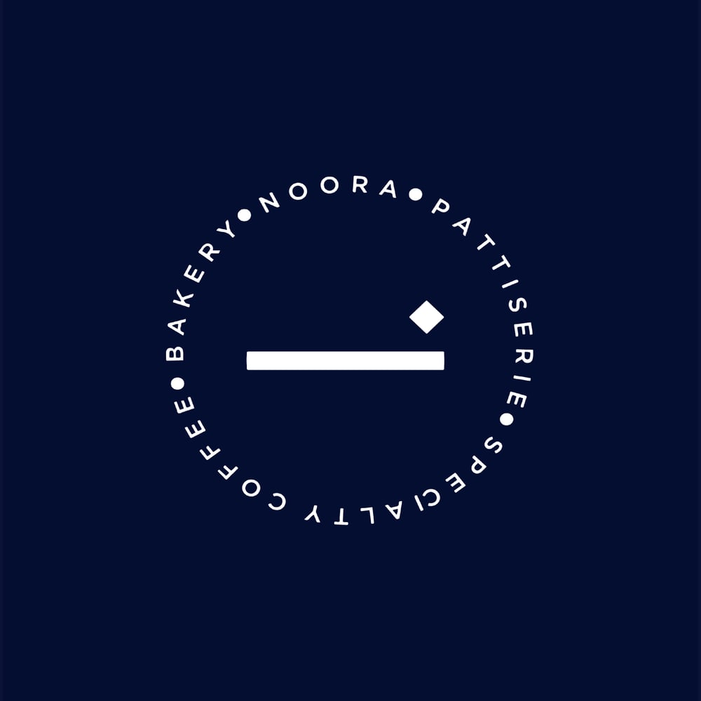The Noora roundel with bakery, patisserie and specialty coffee set around the mark.